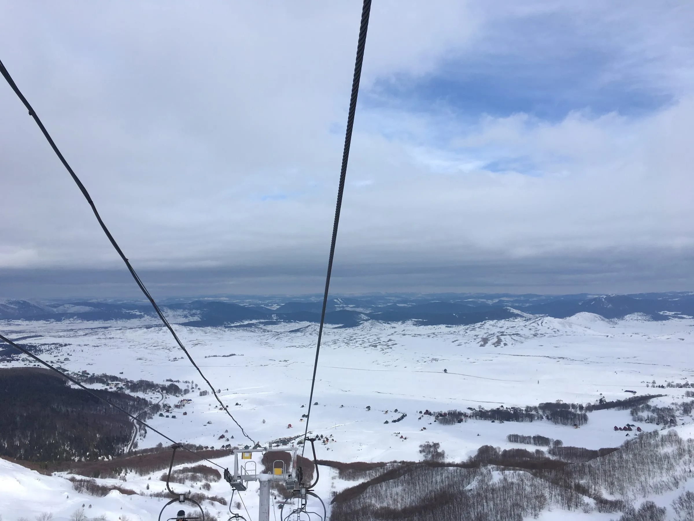 Snow-covered Žabljak plateau seen from a Durmitor ski chairlift in February